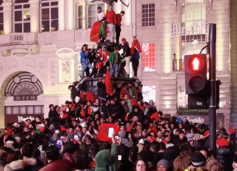 Moroccans Celebrating Their Victory by Dancing and Chanting in London Streets