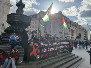 “Red Ribbons” rally in Piccadilly Circus calling for the release of Palestinian child detainees