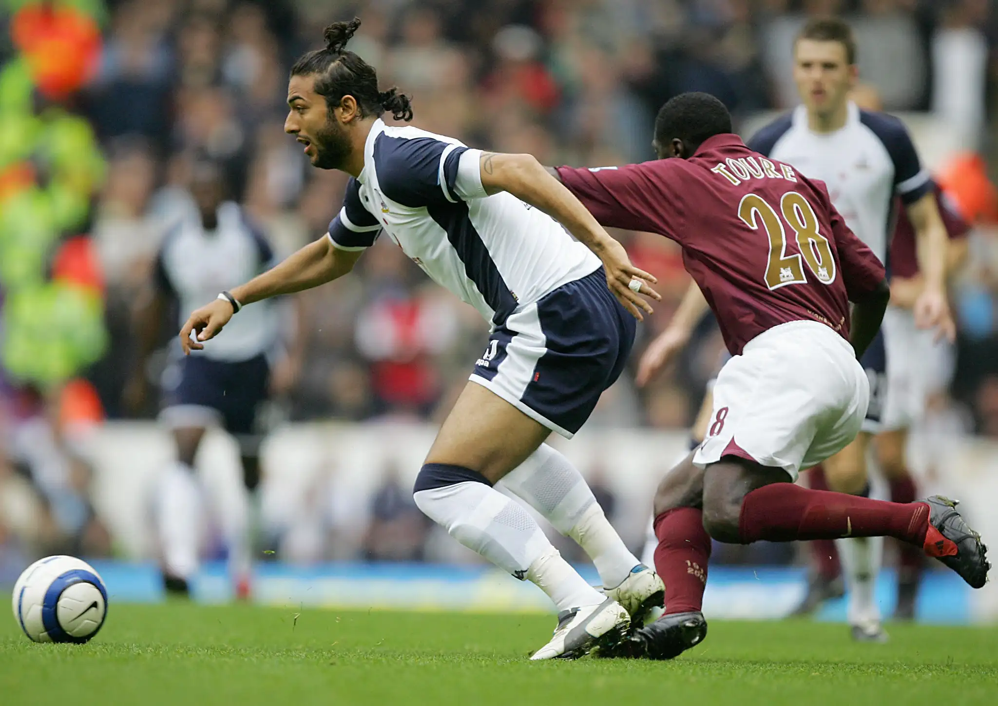 Who are the Arab players who participated in the English Football League over the last hundred years?